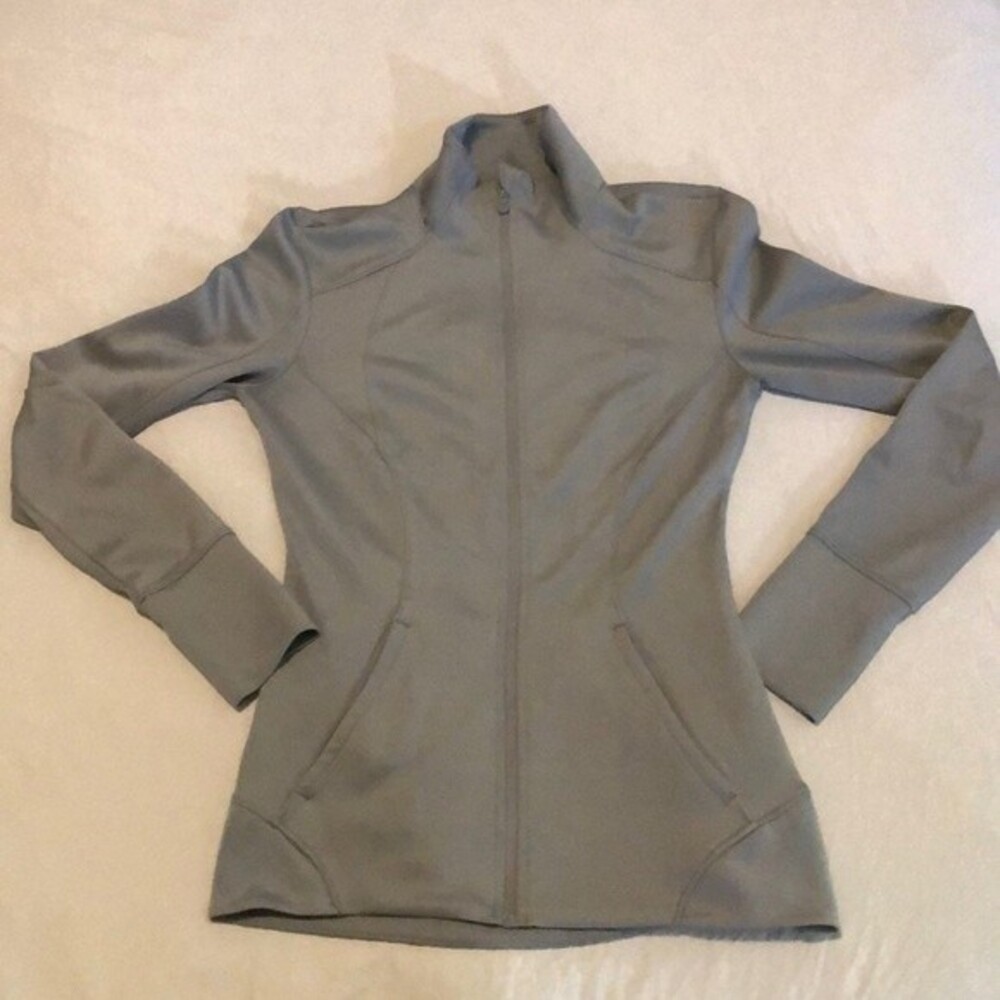 Apana light blue running jacket with thumbholes and two pockets size XS